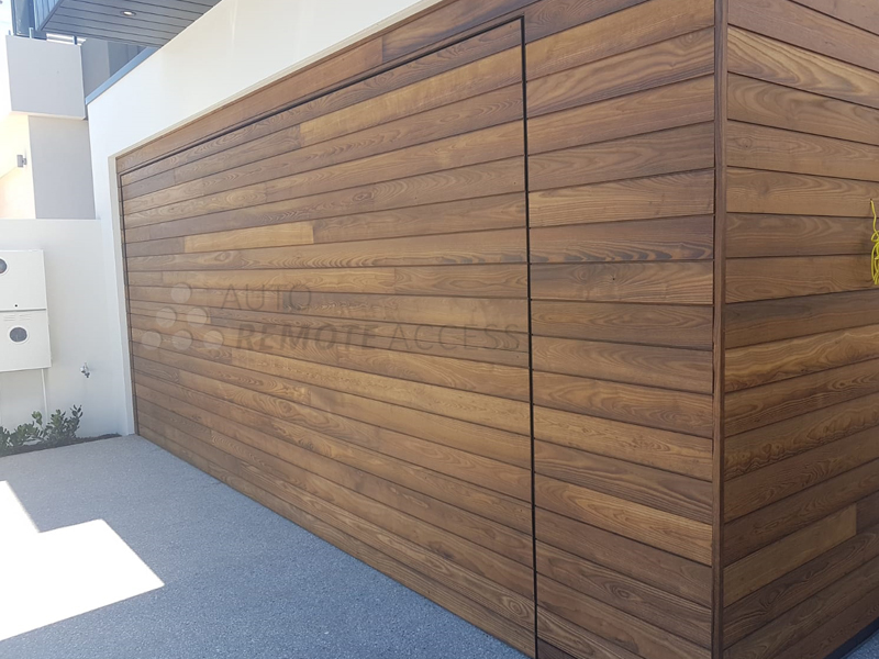 Woodn custom garage door installed by Araccess in Melbourne